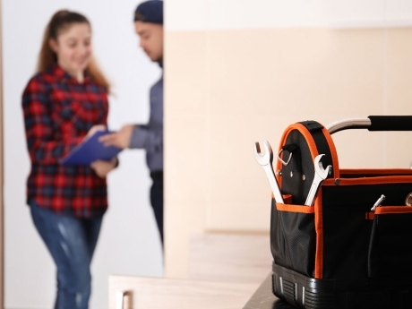 Contractor with homeowner at house