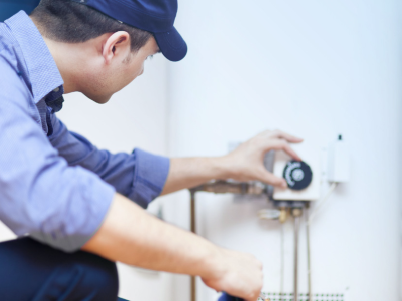 Worker completing an energy assestment. 